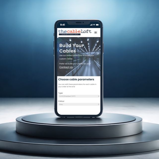 A phone with a website screenshot on the screen